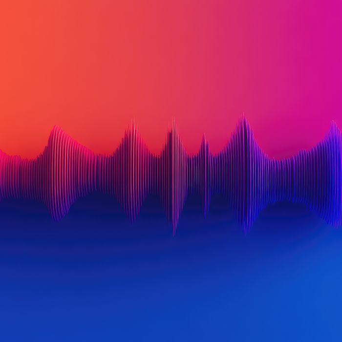 Vibrant audio waveforms in shades of pink and blue, representing sound and energy.
